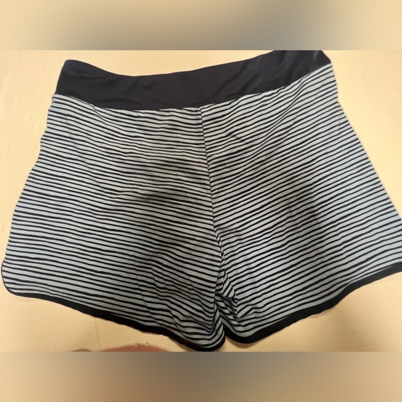 HANG TEN MENS SWIM TRUNKS. SIZE LARGE. 
LIGHT AND DARK BLUE STRIPES. - Picture 11 of 12